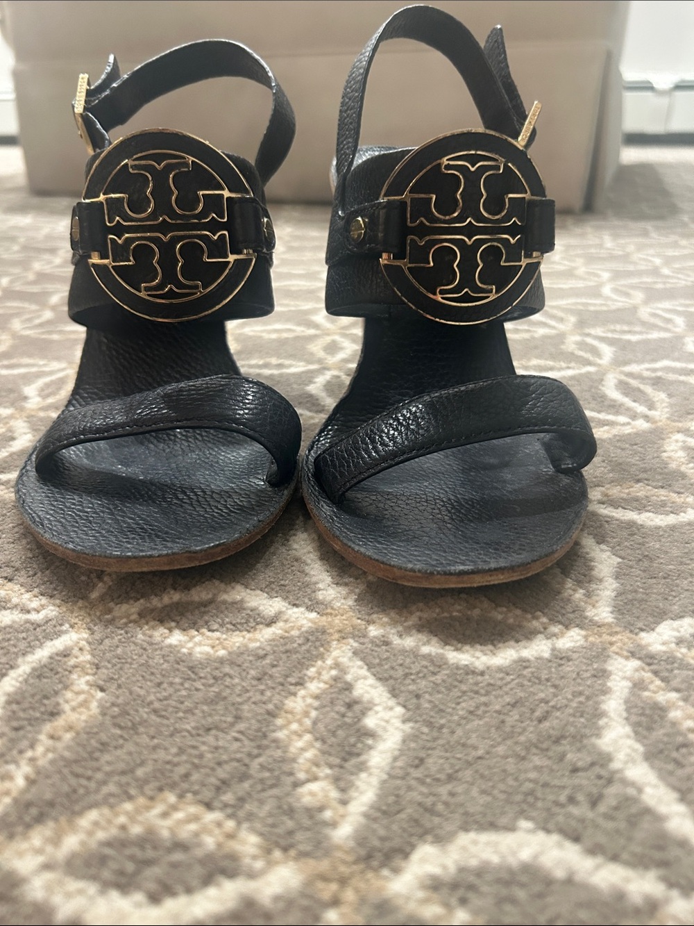 Tory Burch Black Leather Sandals with Gold Logo Emblems